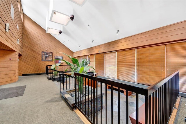 2 Fountain Ln Unit 3P, Scarsdale, NY 10583 - corridor with lofted ceiling, wood walls, an upstairs landing, and a skylight