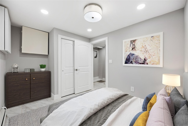 2715 Seymour Ave, Bronx, NY 10469 - bedroom with light marble finish floors, recessed lighting, a closet, and baseboard heating