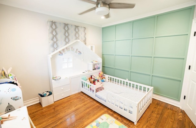 84 Scherer Blvd, Franklin Square, NY 11010 - bedroom featuring wood finished floors, crown molding, and ceiling fan
