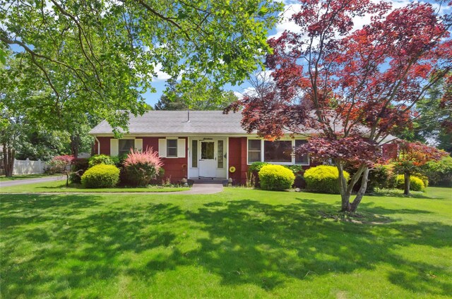 16 Colonial Dr, East Patchogue, NY 11772 - single story home featuring a front yard