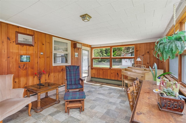 16 Colonial Dr, East Patchogue, NY 11772 - sitting room featuring a baseboard heating unit and wooden walls