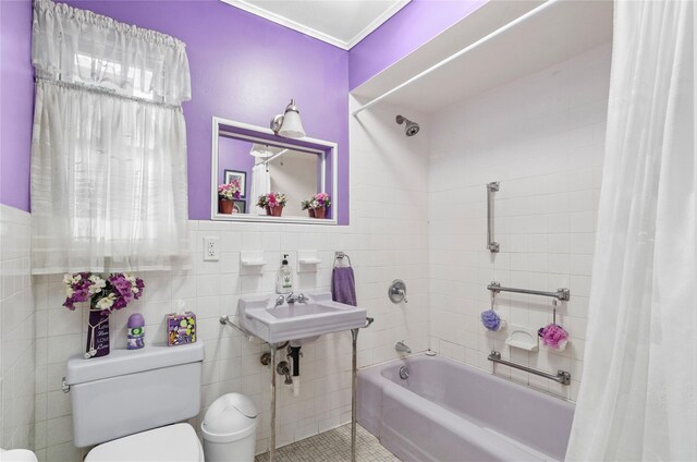 16 Colonial Dr, East Patchogue, NY 11772 - bathroom featuring tile walls, shower / tub combo with curtain, and tile patterned floors