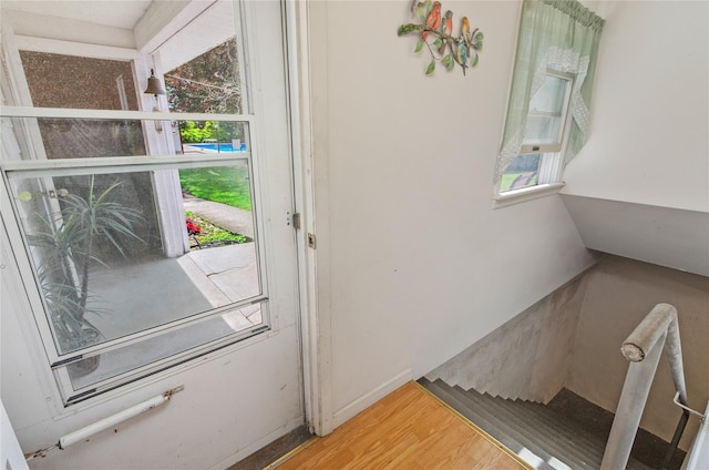 16 Colonial Dr, East Patchogue, NY 11772 - entryway featuring plenty of natural light and wood finished floors