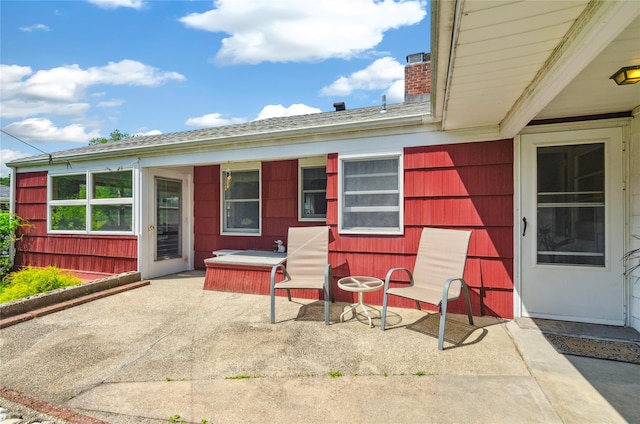 16 Colonial Dr, East Patchogue, NY 11772 - view of patio / terrace featuring a hot tub