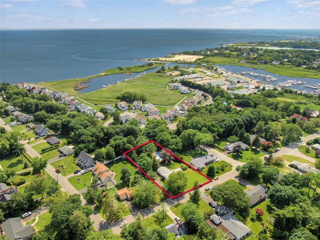 16 Colonial Dr, East Patchogue, NY 11772 - aerial perspective of suburban area featuring a large body of water and property boundaries highlighted