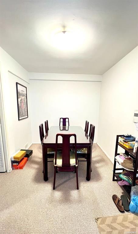 3815 149th St Unit 2D, Flushing, NY 11354 - dining room with light colored carpet