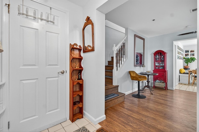 204 Watch Hill Dr, Tarrytown, NY 10591 - entrance foyer with stairs and light wood-type flooring
