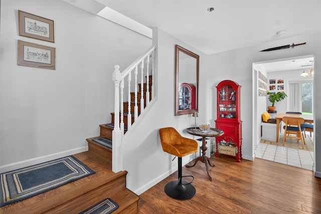 204 Watch Hill Dr, Tarrytown, NY 10591 - staircase with wood finished floors and baseboards