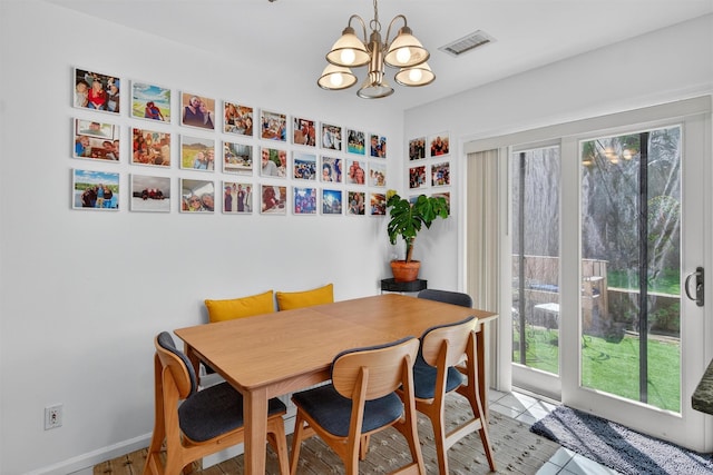 204 Watch Hill Dr, Tarrytown, NY 10591 - dining space with a chandelier and plenty of natural light