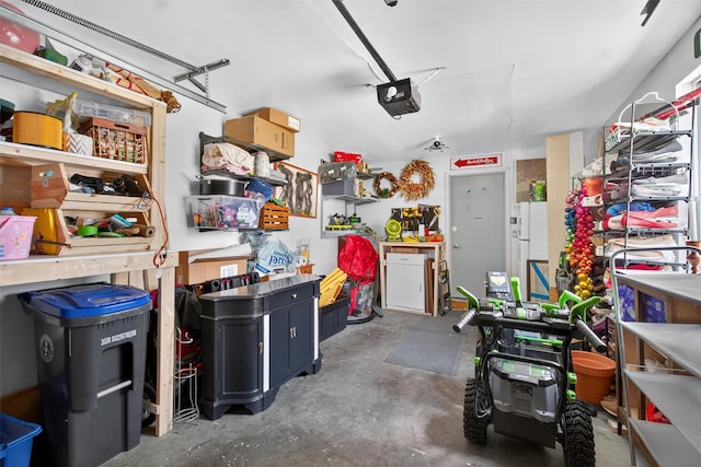 204 Watch Hill Dr, Tarrytown, NY 10591 - garage featuring a garage door opener and freestanding refrigerator