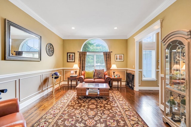 40 Independence Way, Miller Place, NY 11764 - living room with wood finished floors, crown molding, wainscoting, and recessed lighting