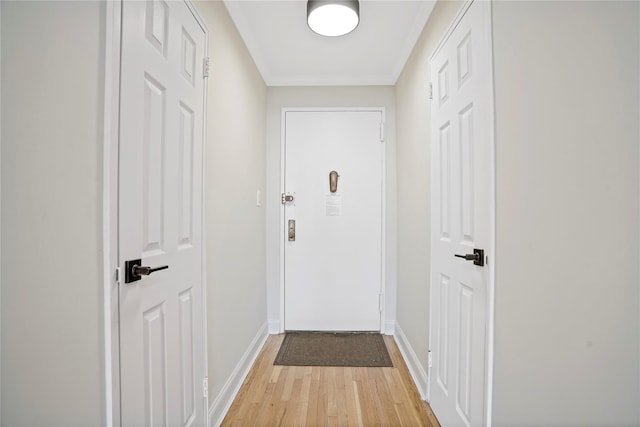86-29 155th Ave Unit 5N, Howard Beach, NY 11414 - doorway with light wood-type flooring and crown molding