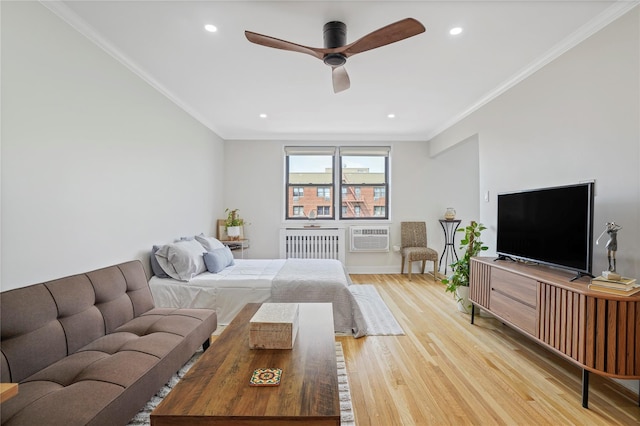 86-29 155th Ave Unit 5N, Howard Beach, NY 11414 - bedroom featuring radiator, light wood-style floors, ornamental molding, recessed lighting, and an AC wall unit