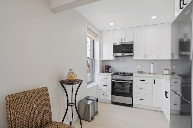 86-29 155th Ave Unit 5N, Howard Beach, NY 11414 - kitchen with stainless steel appliances, tasteful backsplash, healthy amount of natural light, light countertops, and recessed lighting