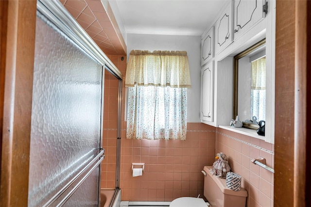 1541 Herzel Blvd, West Babylon, NY 11704 - bathroom with shower / bath combination with glass door and tile walls