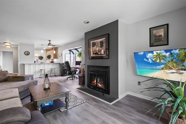 83 Hudson Point Ln, Ossining, NY 10562 - living room with a large fireplace and wood finished floors
