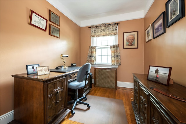 34-42 88th St, Jackson Heights, NY 11372 - office featuring wood finished floors and radiator heating unit