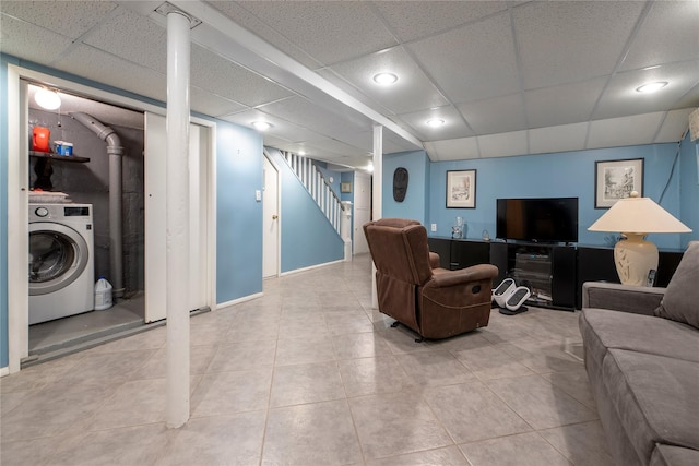 34-42 88th St, Jackson Heights, NY 11372 - living room featuring washer / clothes dryer, stairway, a paneled ceiling, and tile patterned flooring