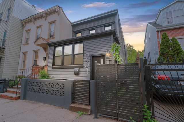 231 Macdougal St, Brooklyn, NY 11233 - view of front facade with a gate