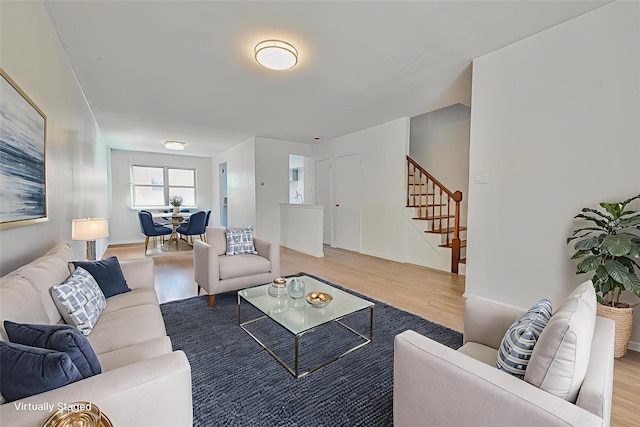 150-01 Horace Harding Expy, Flushing, NY 11367 - living area featuring light wood-style floors and stairs