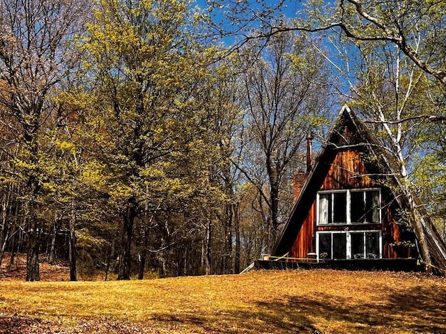 1104 Cold Spring Rd, Clinton Corners, NY 12514 - view of home's exterior featuring a chimney and a barn