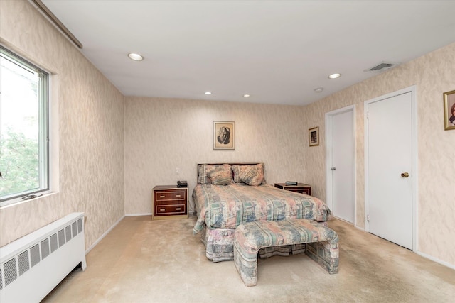 895 Cherry Ln, North Woodmere, NY 11581 - carpeted bedroom with radiator heating unit and recessed lighting