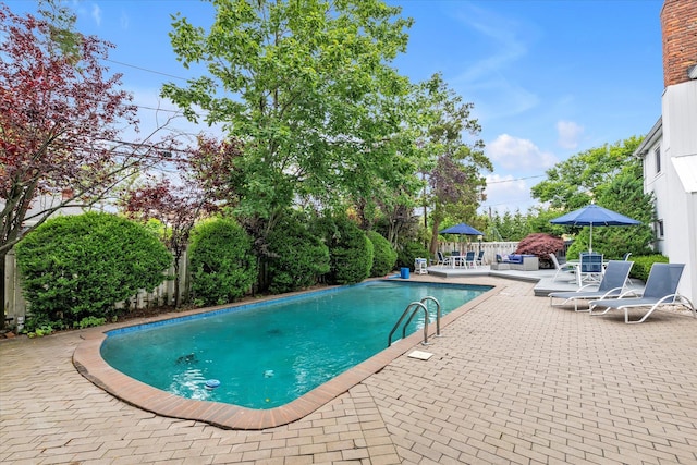 895 Cherry Ln, North Woodmere, NY 11581 - outdoor pool with a patio area