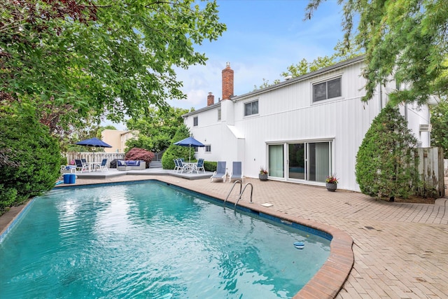 895 Cherry Ln, North Woodmere, NY 11581 - outdoor pool featuring a patio area and outdoor dining area