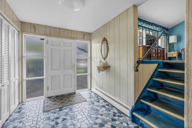17 Edna Dr, Syosset, NY 11791 - foyer entrance featuring wood walls and stairs