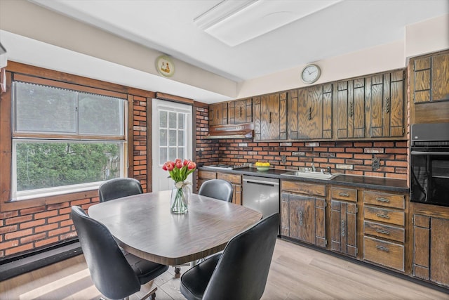 17 Edna Dr, Syosset, NY 11791 - dining area with brick wall and light wood-style floors