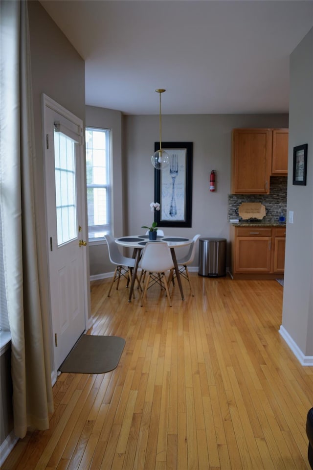 15 Cobblestone Ln, Middletown, NY 10940 - dining area featuring light wood-style flooring and baseboards