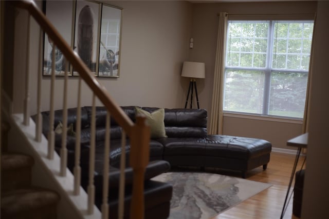 15 Cobblestone Ln, Middletown, NY 10940 - living area with healthy amount of natural light, wood finished floors, and stairway