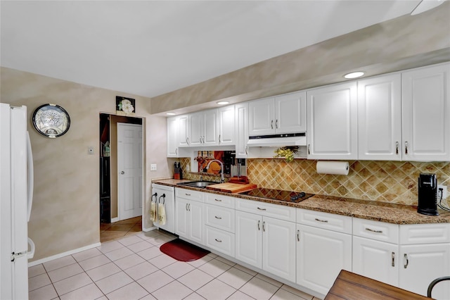 25 Lloyd Ln, Nesconset, NY 11767 - kitchen with white appliances, under cabinet range hood, tasteful backsplash, and white cabinetry