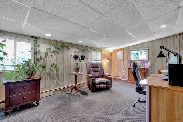 25 Lloyd Ln, Nesconset, NY 11767 - office featuring a drop ceiling, carpet flooring, a baseboard radiator, wood walls, and baseboard heating