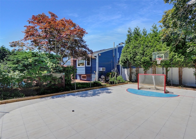 25 Lloyd Ln, Nesconset, NY 11767 - view of sport court featuring basketball court and a sport area