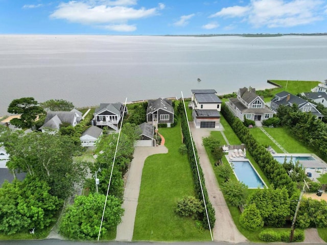 15 Bayside Ave, East Quogue, NY 11942 - aerial view of residential area with property parcel outlined and a large body of water