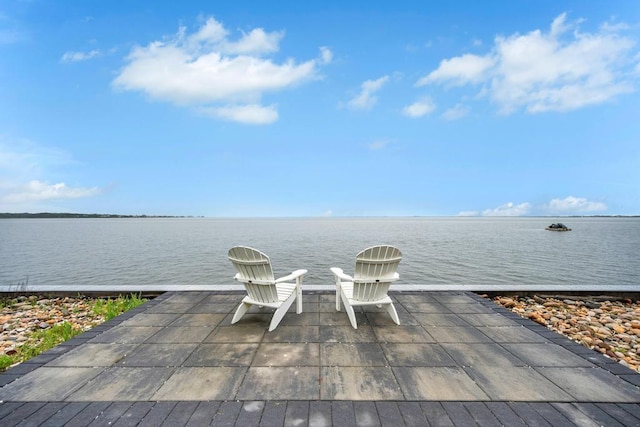 15 Bayside Ave, East Quogue, NY 11942 - view of patio / terrace featuring a water view and a boat dock