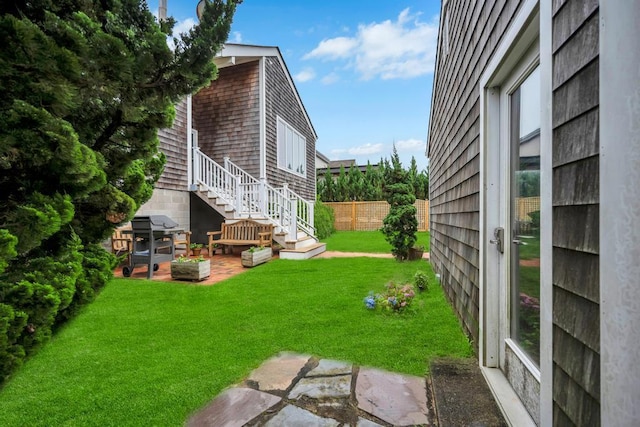 15 Bayside Ave, East Quogue, NY 11942 - view of yard featuring a patio area and stairway