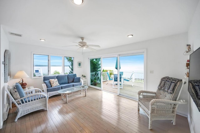 15 Bayside Ave, East Quogue, NY 11942 - living room with a ceiling fan, hardwood / wood-style flooring, and recessed lighting