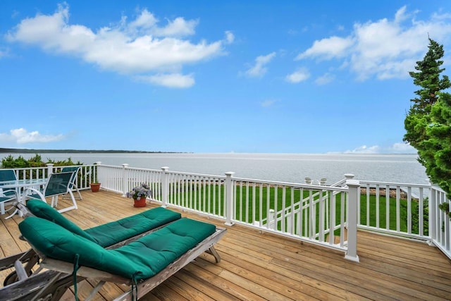 15 Bayside Ave, East Quogue, NY 11942 - wooden terrace featuring a water view and outdoor dining space