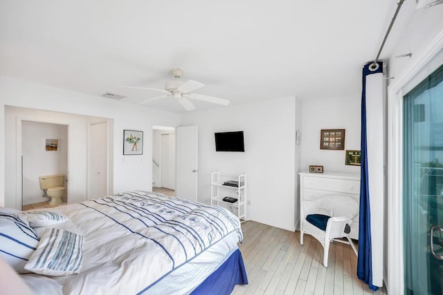 15 Bayside Ave, East Quogue, NY 11942 - bedroom with light wood-type flooring and a ceiling fan