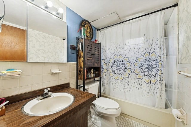 529 8th Ave, New Hyde Park, NY 11040 - full bath with tile walls, shower / bath combo with shower curtain, vanity, and tile patterned floors