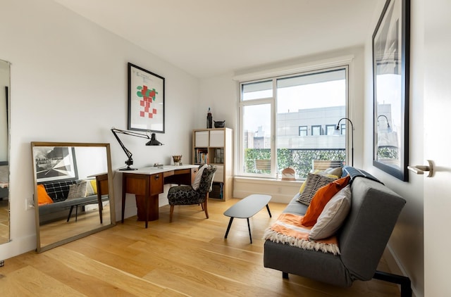 133 Bch 116th St Unit 4M, Rockaway Beach, NY 11694 - sitting room featuring light wood finished floors and a desk