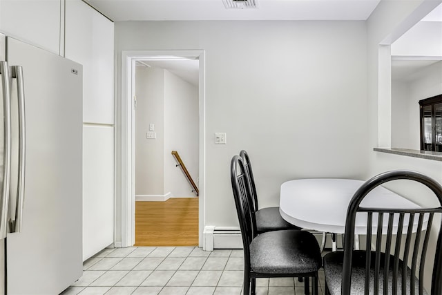 33 Balmoral Dr, Chestnut Ridge, NY 10977 - dining area featuring a baseboard heating unit and light tile patterned floors