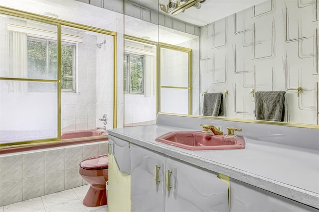 33 Balmoral Dr, Chestnut Ridge, NY 10977 - full bathroom with vanity, tiled shower / bath combo, and marble look tiles