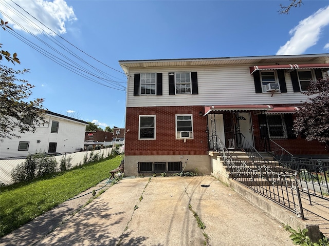 2109 Seward Ave, Bronx, NY 10473 - view of property with brick siding and cooling unit