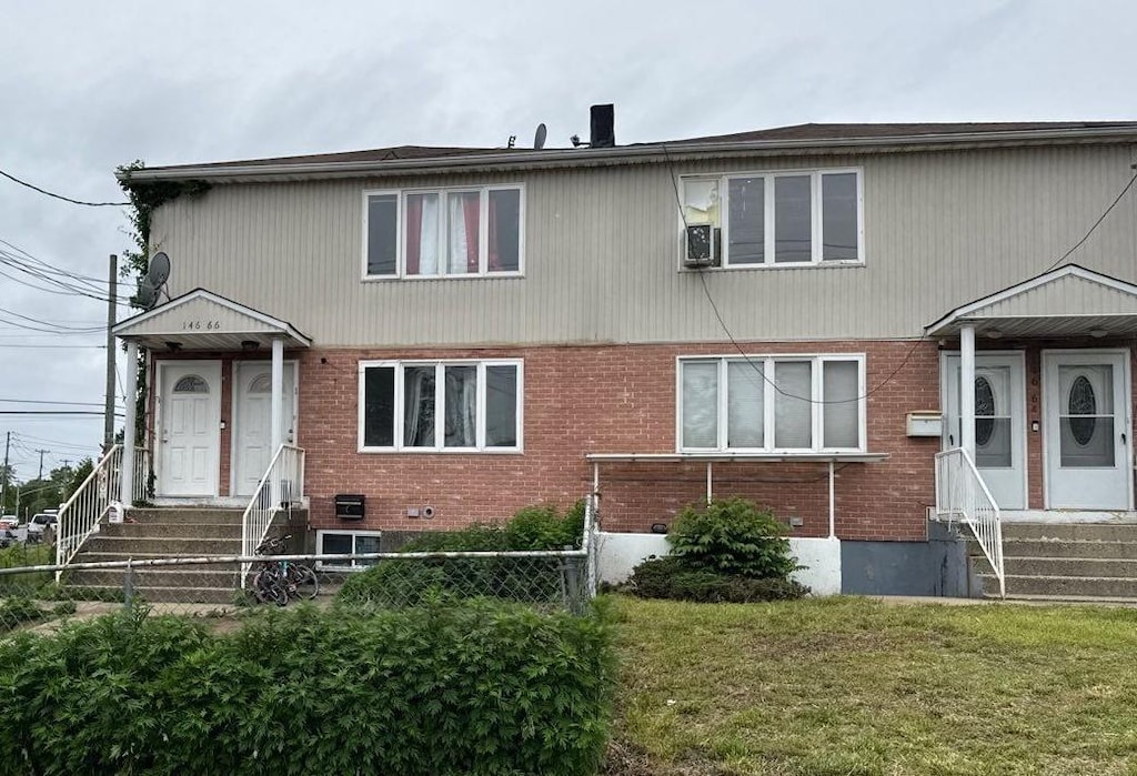 146-66 222nd St, Springfield Gardens, NY 11413 - view of front of property featuring brick siding and entry steps