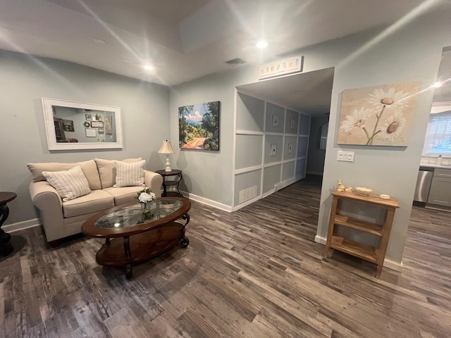 9 Songsparrow Ln, Centereach, NY 11720 - living room featuring wood finished floors, recessed lighting, and built in features