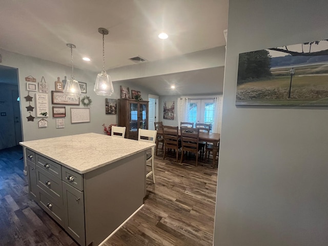 9 Songsparrow Ln, Centereach, NY 11720 - kitchen with dark wood-style floors, light countertops, a center island, recessed lighting, and gray cabinetry