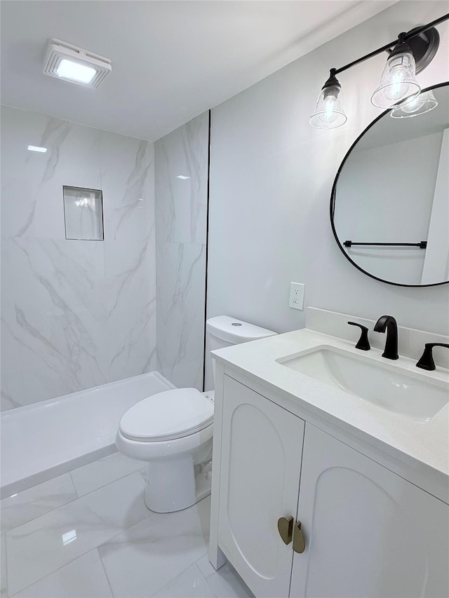 308 Hancock St, Brentwood, NY 11717 - bathroom featuring marble look tile flooring, vanity, and a marble finish shower